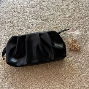 Little black clutch with gold chain